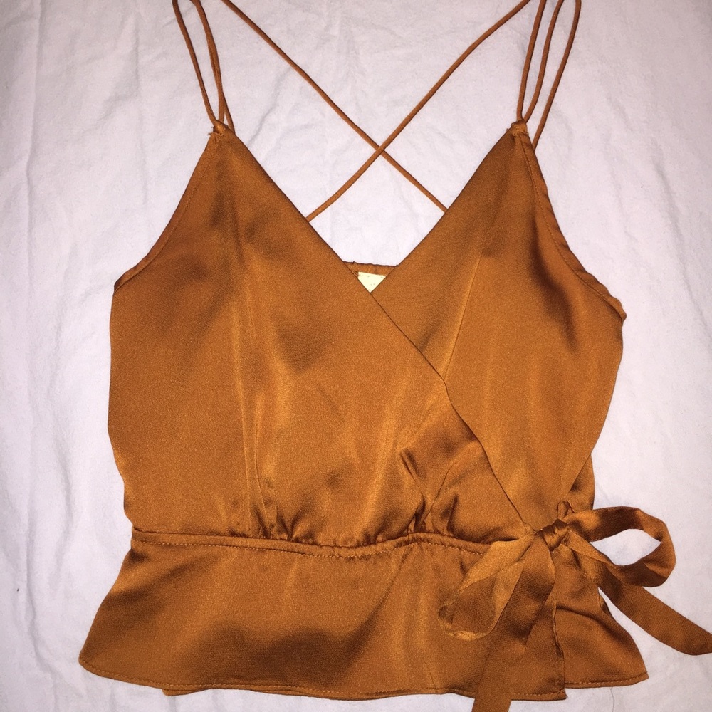 Nice golden Blush tank-top.